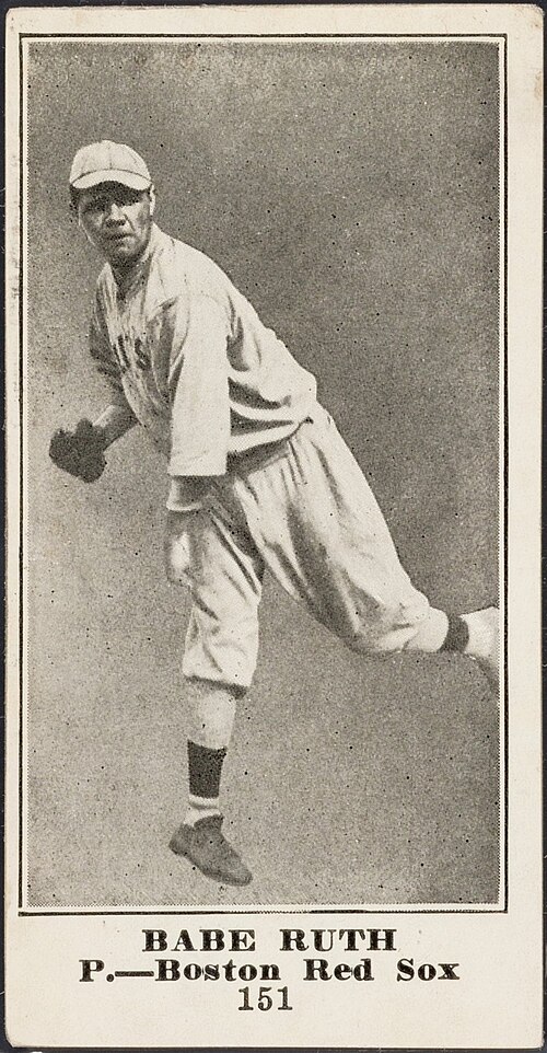 1916 Sporting News M101-4 #151 Babe Ruth rookie card: a black-and-white photograph of Ruth in his Boston Red Sox uniform at the end of his pitching motion, captioned with his name, the position P. and the card number 151