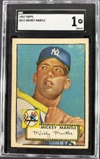 1952 Topps #311 Mickey Mantle card in an SGC 1 holder: a head-and-shoulders portrait of Mantle in pinstripes against a blue sky with his bat raised, the Yankees logo at lower left and his name and facsimile signature in a yellow box