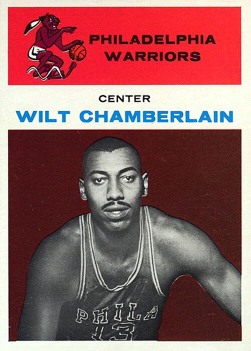 1961-62 Fleer #8 Wilt Chamberlain rookie card: a black-and-white photograph of Chamberlain in his Philadelphia number 13 jersey beneath a red Philadelphia Warriors header, with Center and Wilt Chamberlain printed above the photo