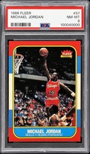 1986 Fleer #57 Michael Jordan rookie card in a PSA 8 holder: Jordan mid-dunk in the red Bulls uniform inside the red, white and blue striped Fleer border, with the Fleer Premier crest and his name on a blue bar